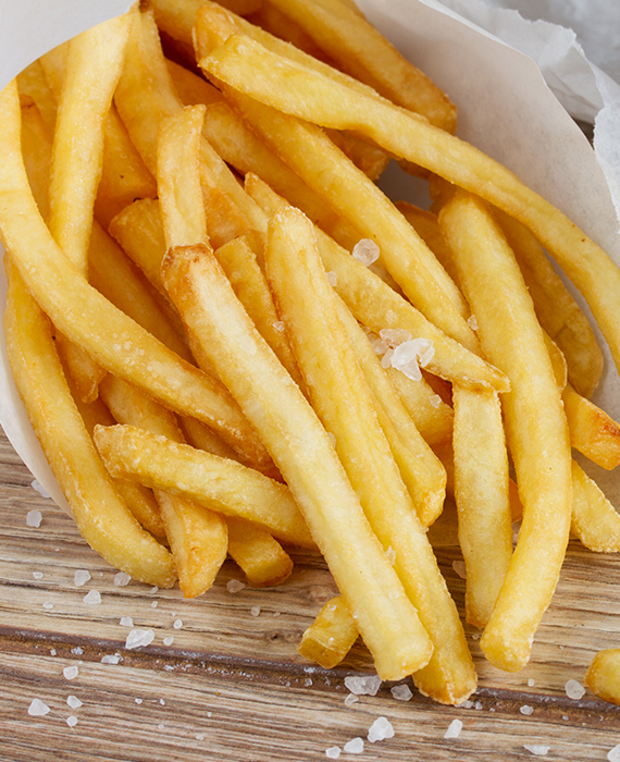 Photo of a double cheeseburger and salty fries