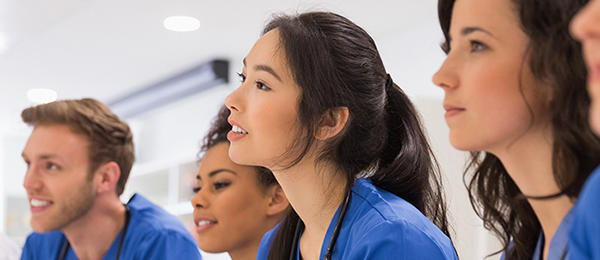 Nurses engaged in mentoring session
