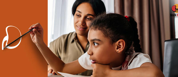 Image of a young girl holding a paintbrush while her mother looks on
